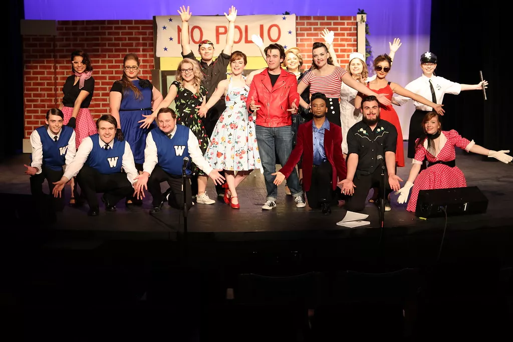 The Cry Baby Cast poses for a cute cast photo in their 1950s costumes. 