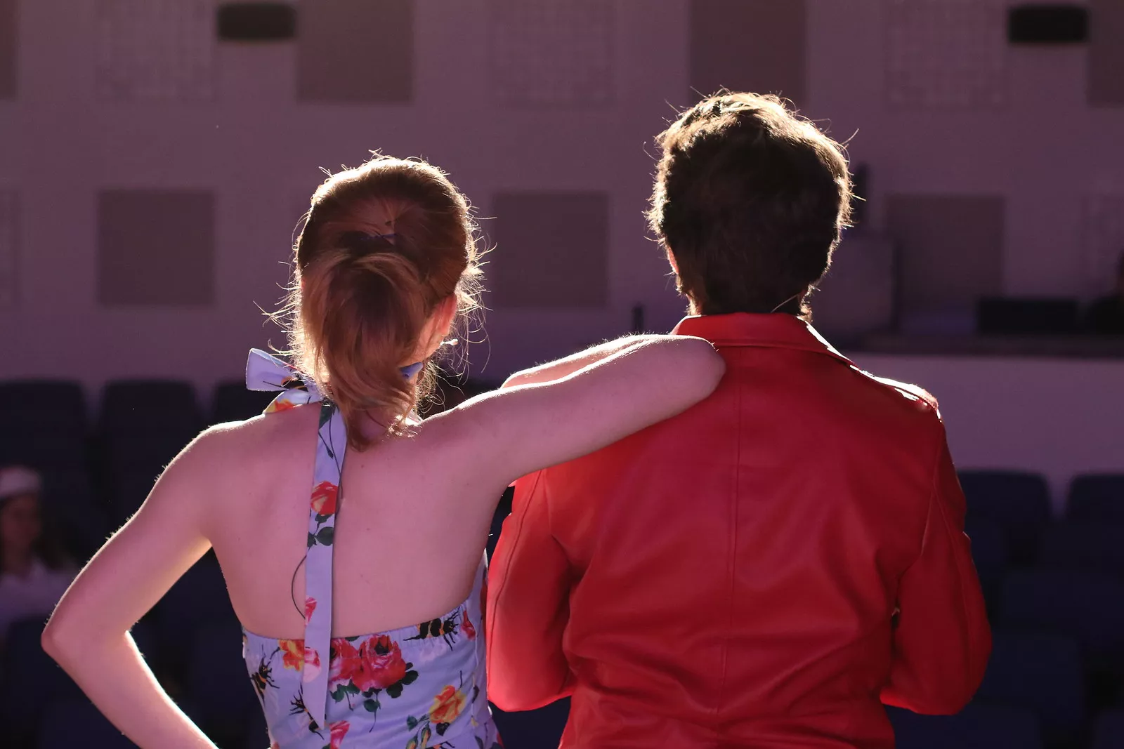 A couple from Crybaby posing with their backs to the camera
